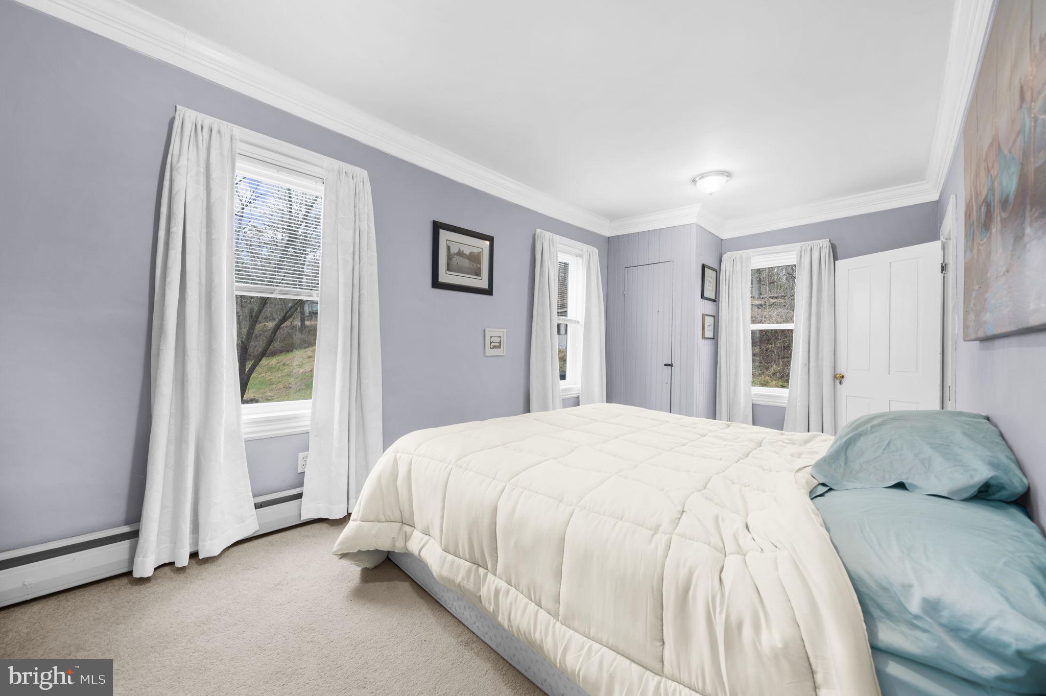 103 Gravel Pike Green Lane, PA 18054 - Photo 21 of 43 a bedroom with a bed and a window