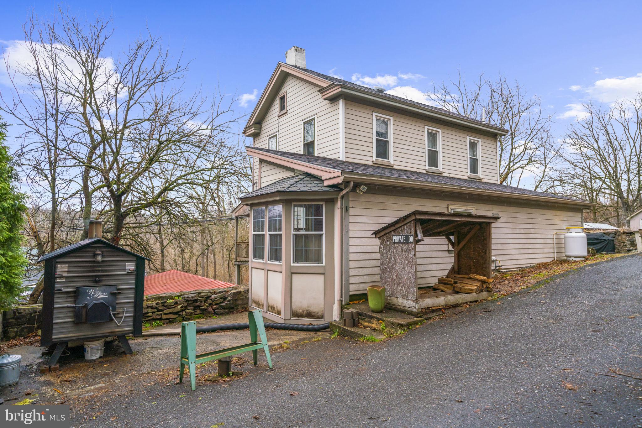103 Gravel Pike Green Lane, PA 18054 - Photo 28 of 43 a front view of a house with garage