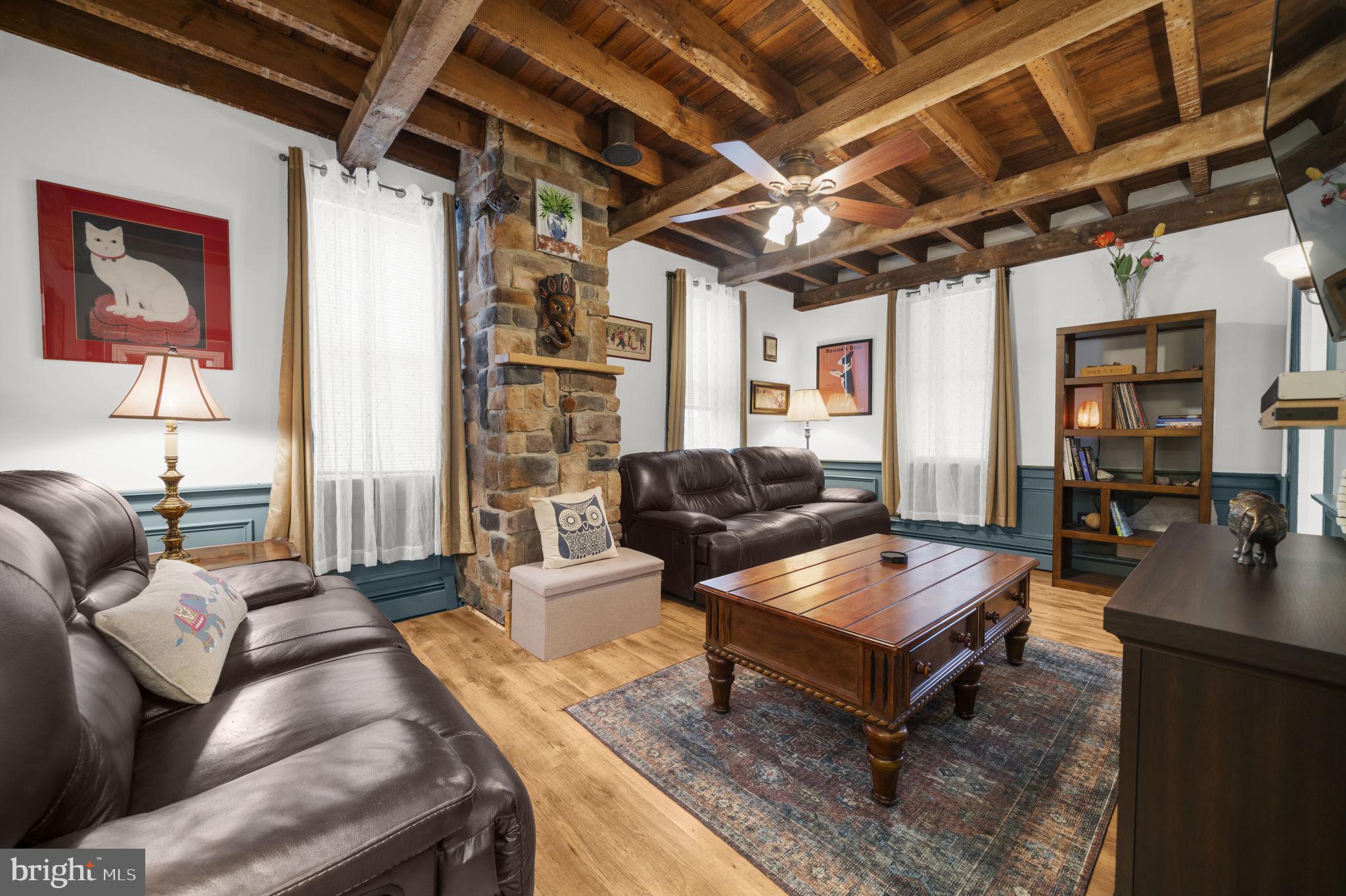 103 Gravel Pike Green Lane, PA 18054 - Photo 3 of 43 a living room with furniture and a flat screen tv