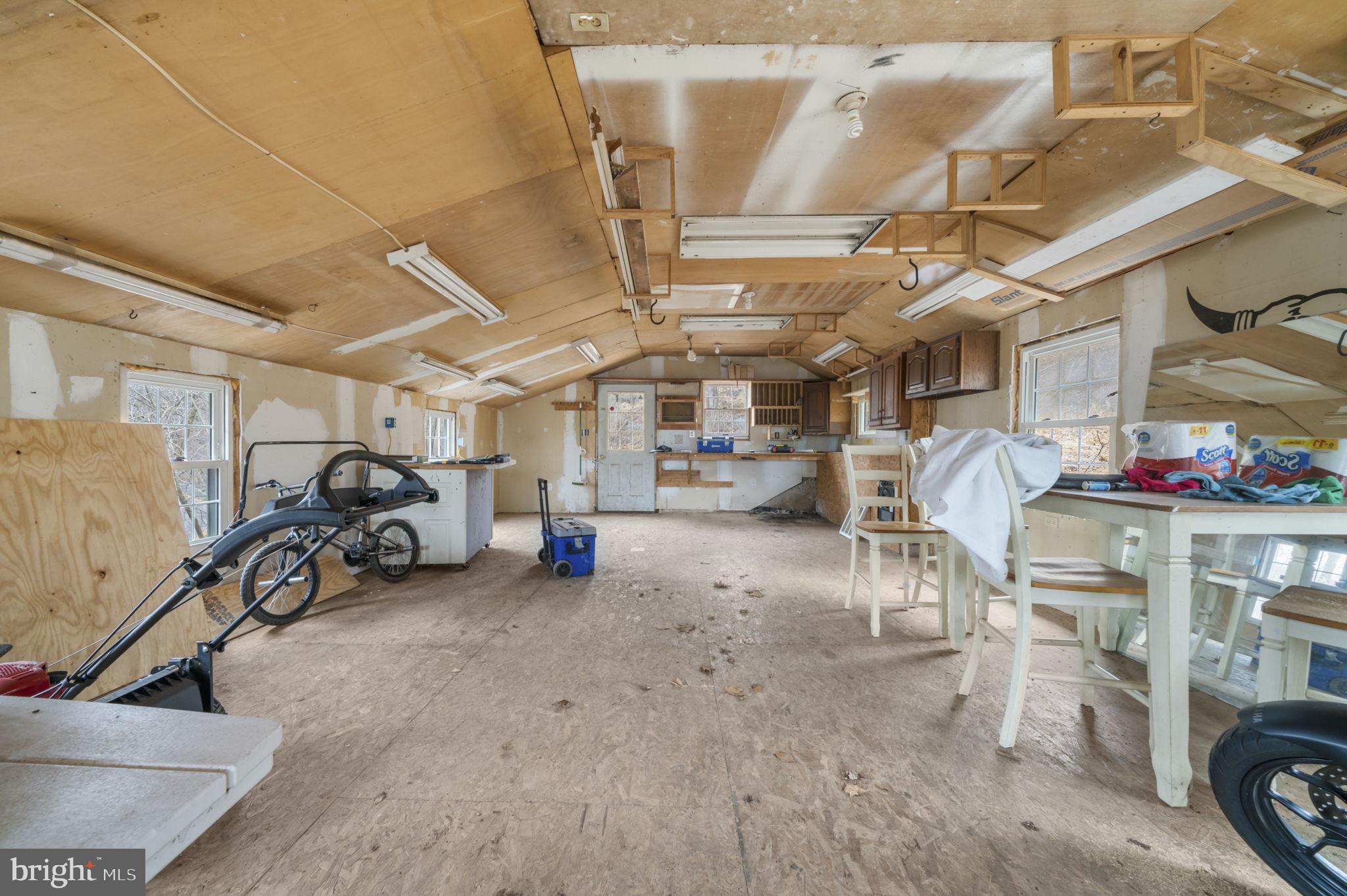 103 Gravel Pike Green Lane, PA 18054 - Photo 33 of 43 a view of parking garage with cars