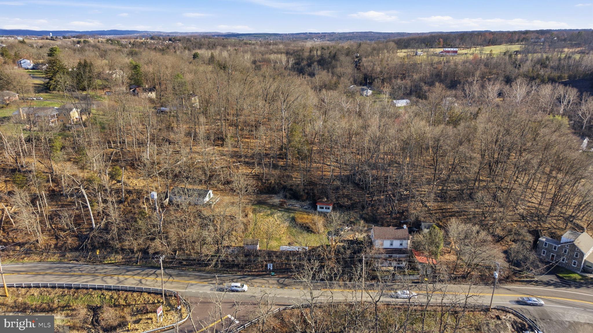 103 Gravel Pike Green Lane, PA 18054 - Photo 37 of 43 a view of a city with lush green forest