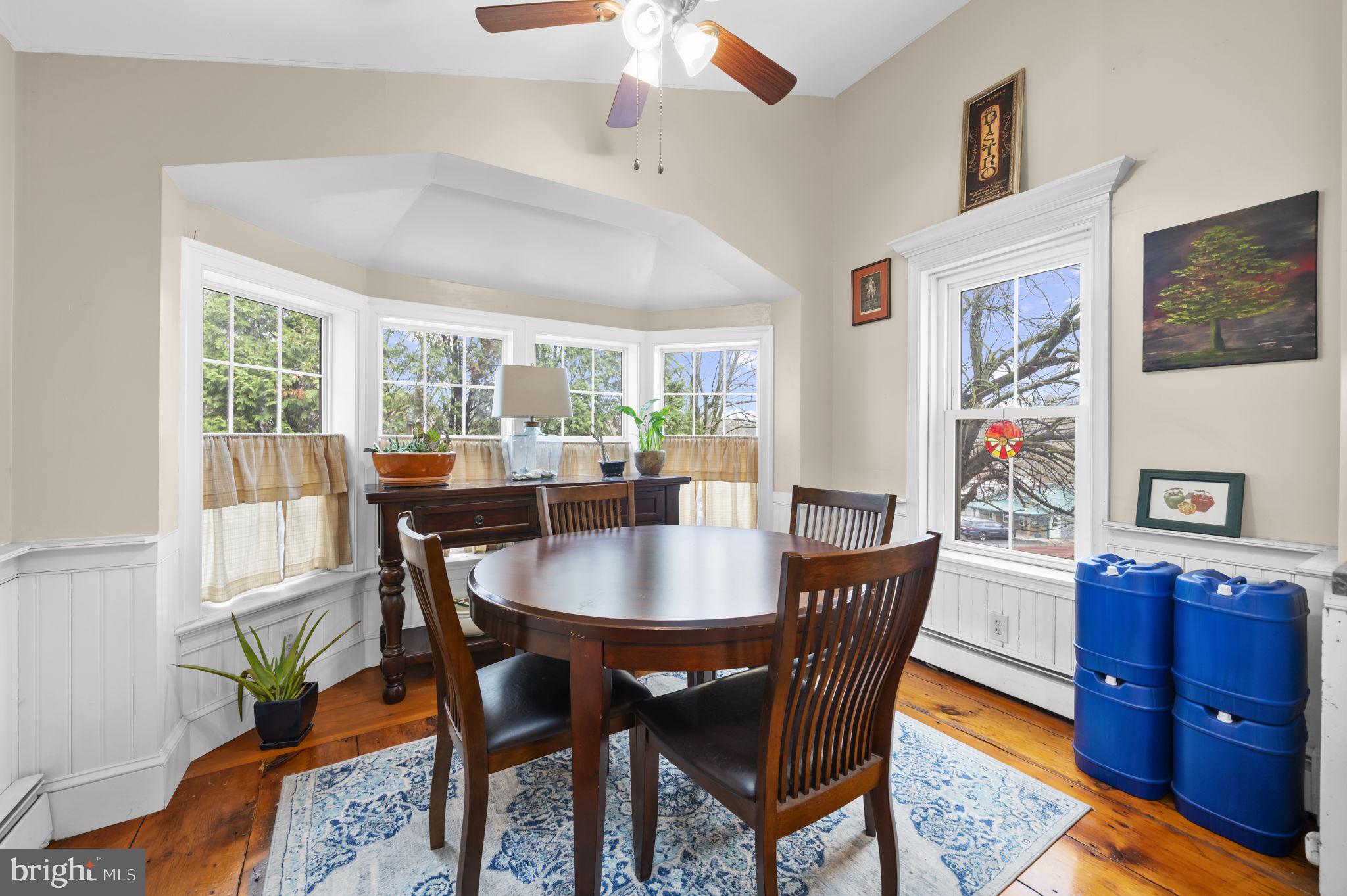 103 Gravel Pike Green Lane, PA 18054 - Photo 5 of 43 a view of a dining room with furniture window and wooden floor