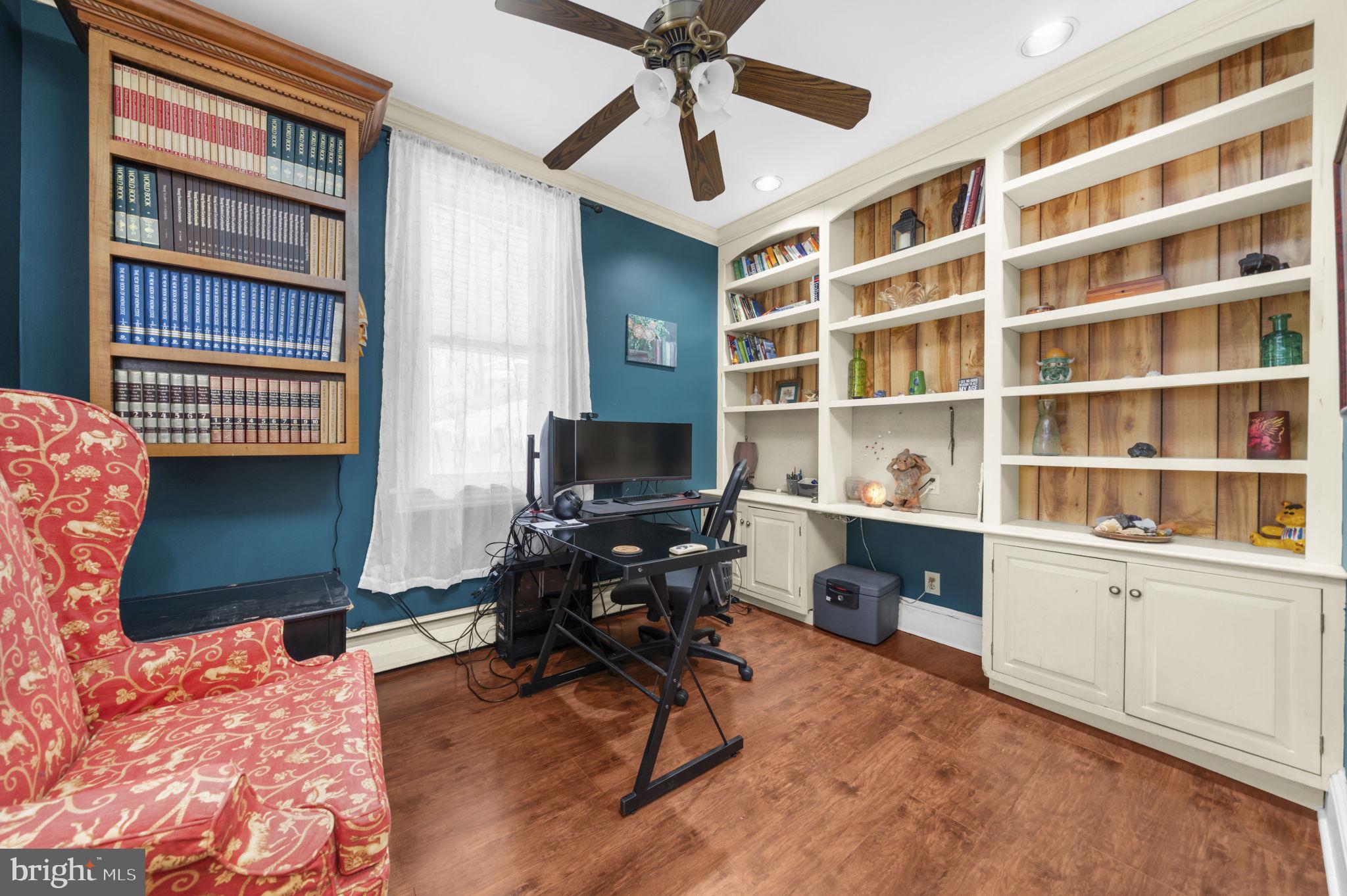 103 Gravel Pike Green Lane, PA 18054 - Photo 6 of 43 a view of a livingroom with workspace and a window