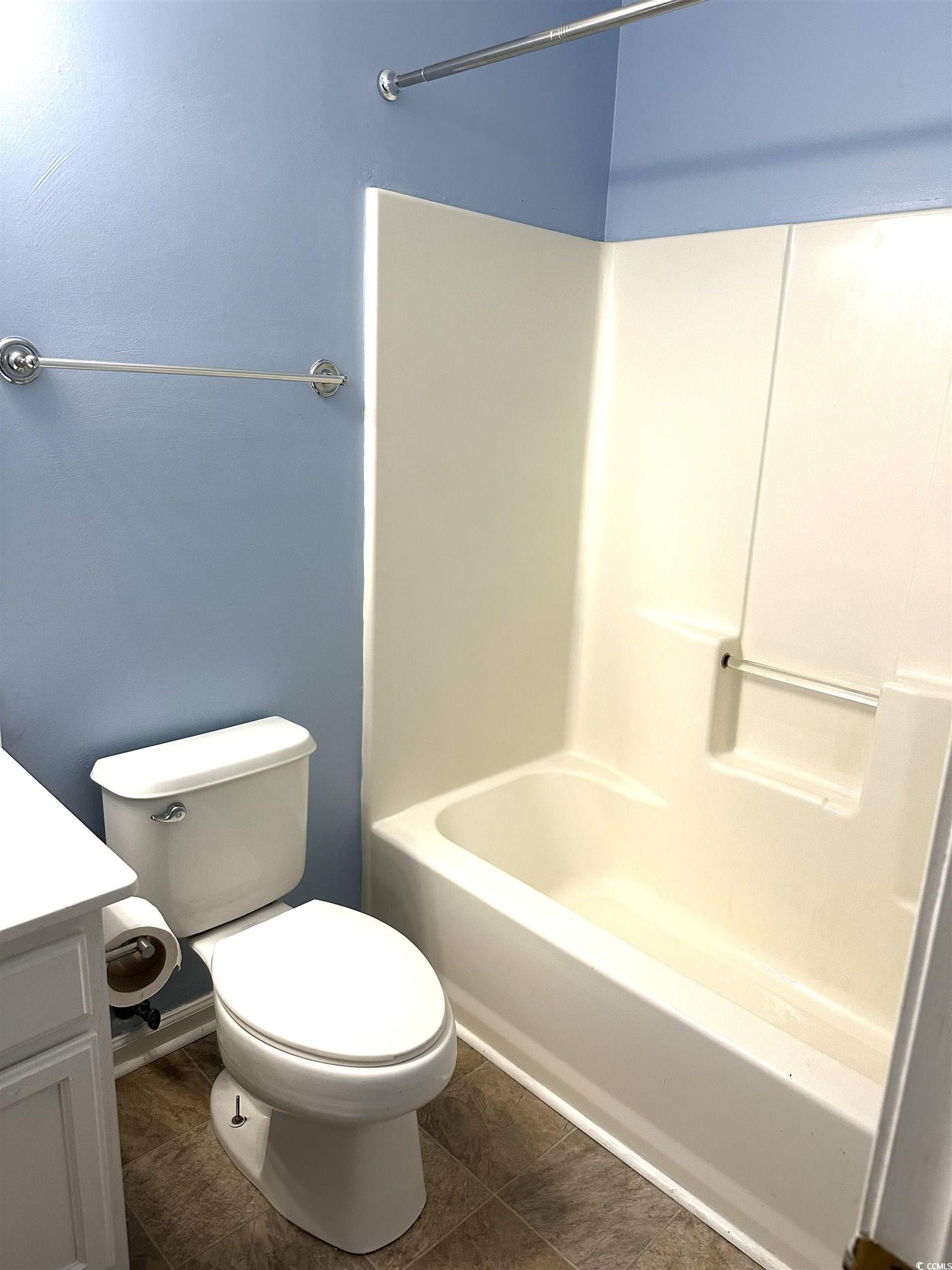 178 Beaver Pond Loop, Unit 60 Pawleys Island, SC 29585 - Photo 21 of 21 Bathroom with vanity and a textured ceiling