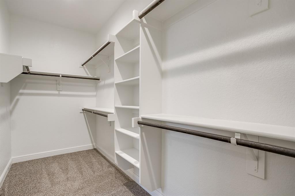 2361 Waggoner Rnch Drive Weatherford, TX 76087 - Photo 12 of 19 a view of walk in closet with empty racks