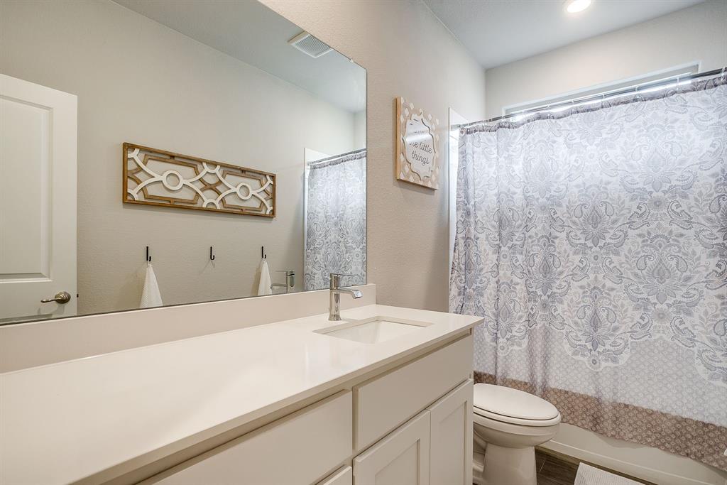 2361 Waggoner Rnch Drive Weatherford, TX 76087 - Photo 15 of 19 a bathroom with a sink and a mirror