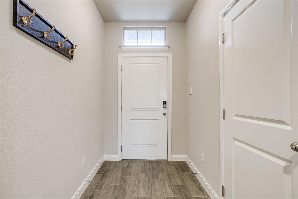 2361 Waggoner Rnch Drive Weatherford, TX 76087 - Photo 2 of 19 a view of a room that has a window in it