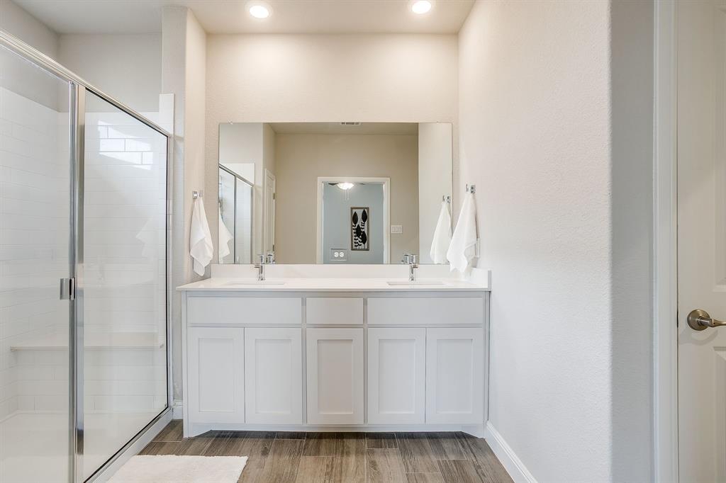 2361 Waggoner Rnch Drive Weatherford, TX 76087 - Photo 10 of 19 a bathroom with a sink and a mirror