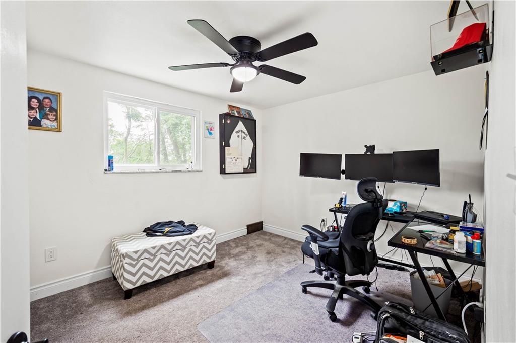 449 Decatur Avenue Pittsburgh, PA 15221 - Photo 11 of 24 a work room with furniture and windows