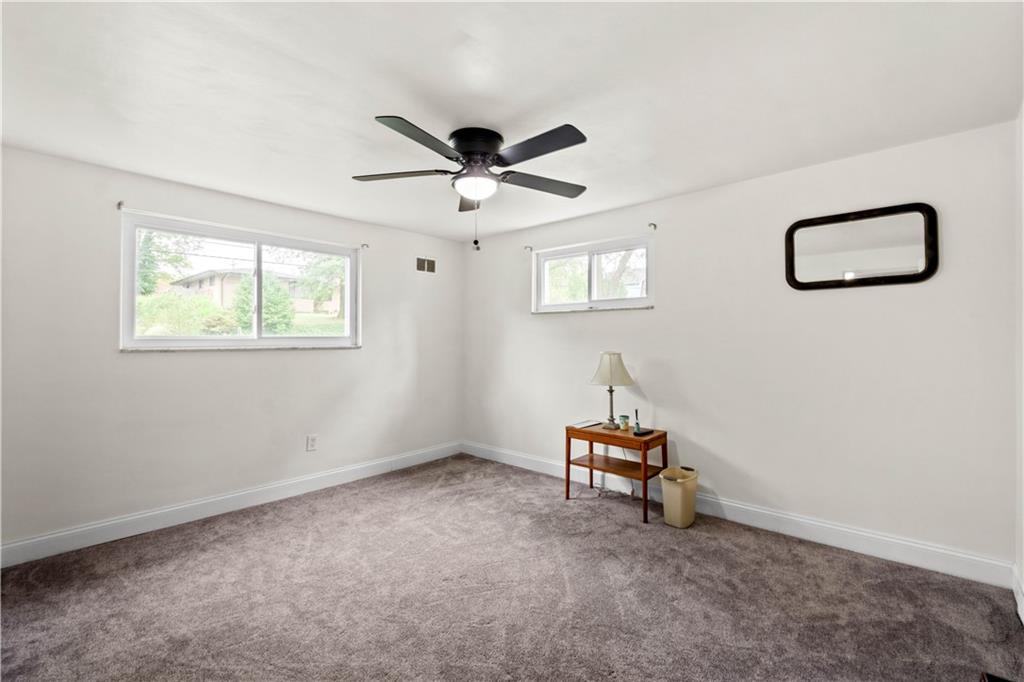 449 Decatur Avenue Pittsburgh, PA 15221 - Photo 13 of 24 a room with a window and a fan