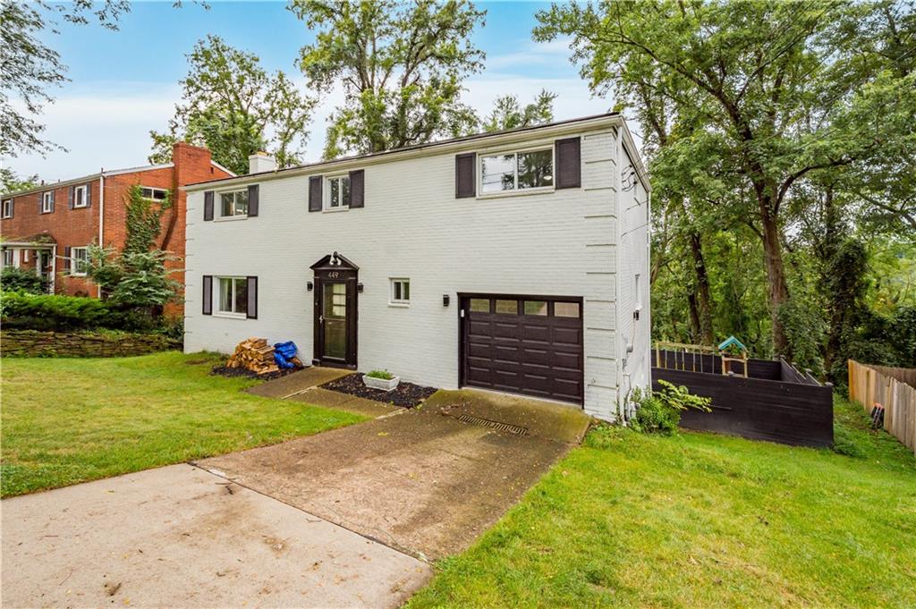 449 Decatur Avenue Pittsburgh, PA 15221 - Photo 2 of 24 front view of a house with a yard