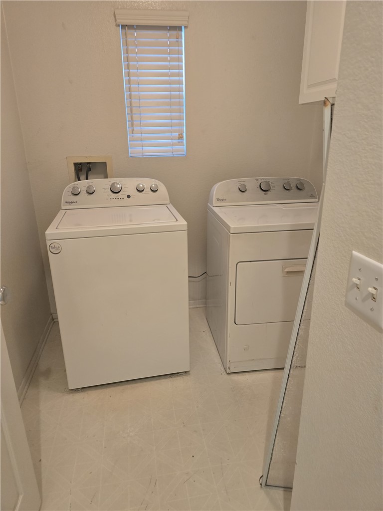 42165 Calabria Drive Temecula, CA 92591 - Photo 3 of 10 a utility room with dryer and washer