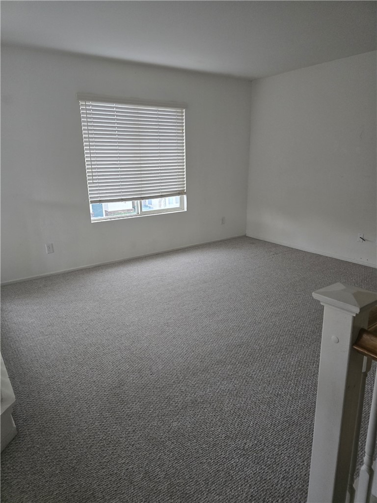 42165 Calabria Drive Temecula, CA 92591 - Photo 4 of 10 an empty room with a window