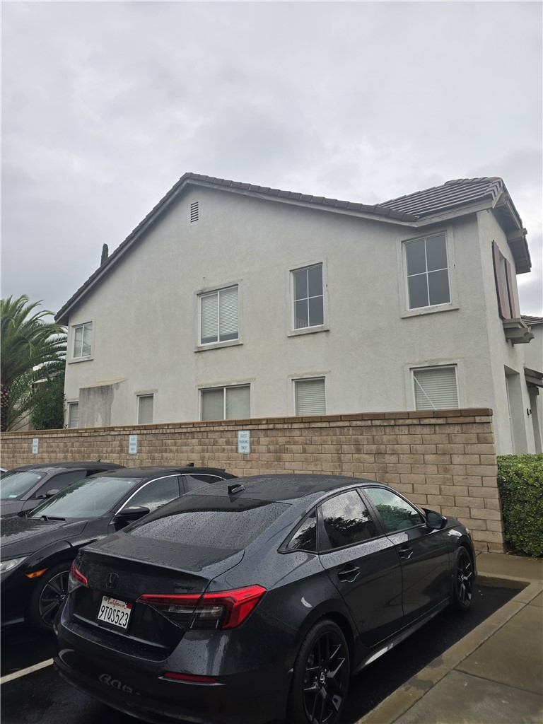 42165 Calabria Drive Temecula, CA 92591 - Photo 10 of 10 a view of a car parked in front of a house