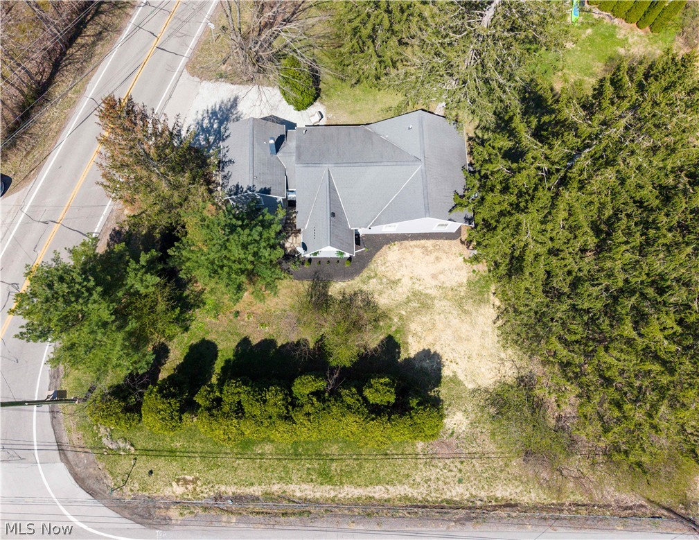 14939 Caves Road Novelty, OH 44072 - Photo 42 of 42 Aerial view of property and surrounding area featuring a tree filled landscape