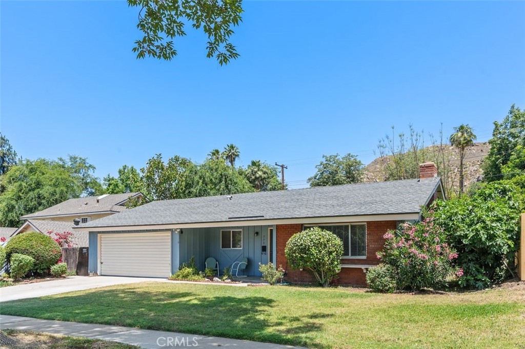 775 Spruce Street Riverside, CA 92507 - Photo 1 of 1 front view of a house with a yard