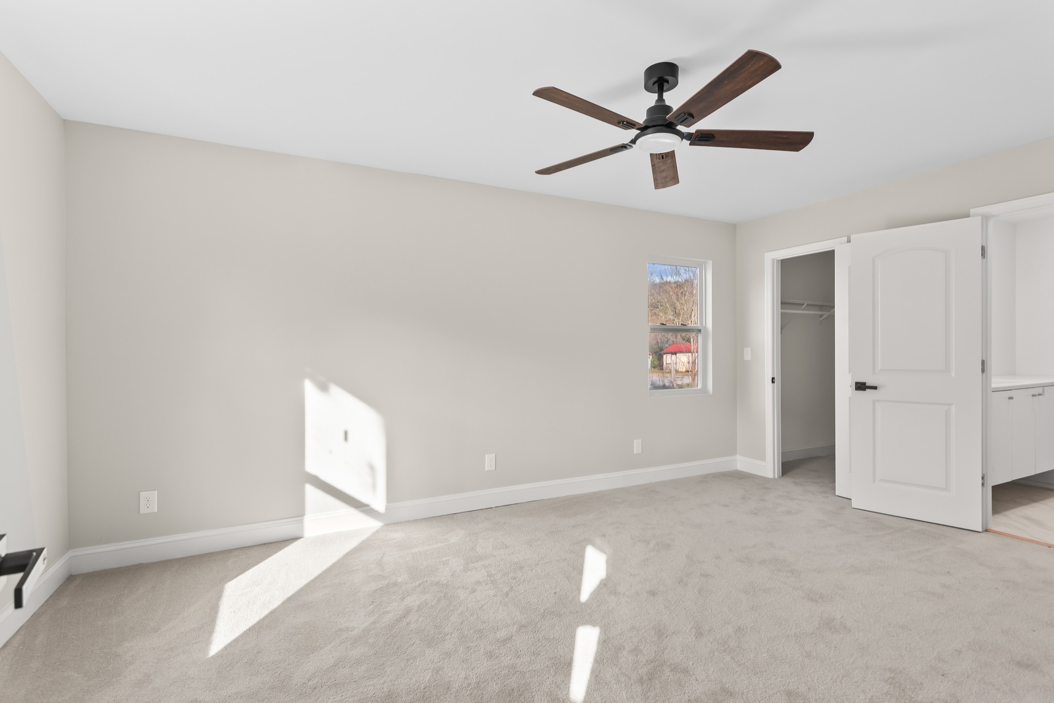 8637 Dog Branch Road Mount Pleasant, TN 38474 - Photo 12 of 44 a view of a livingroom with a ceiling fan & hardwood floor