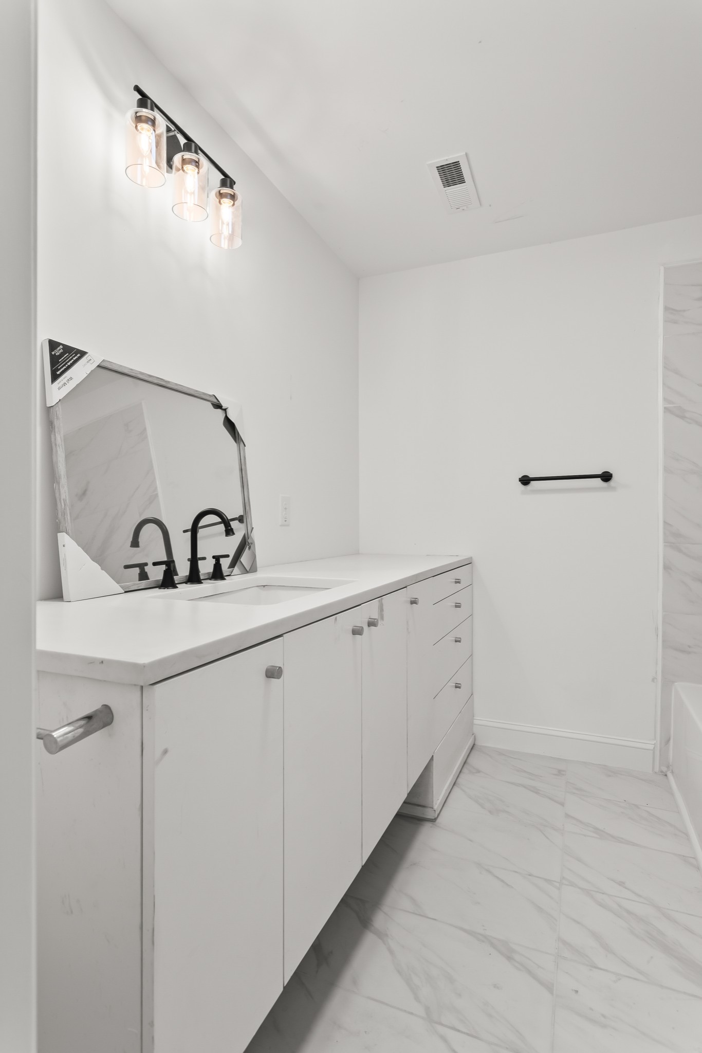 8637 Dog Branch Road Mount Pleasant, TN 38474 - Photo 15 of 44 a view of a kitchen with white cabinets