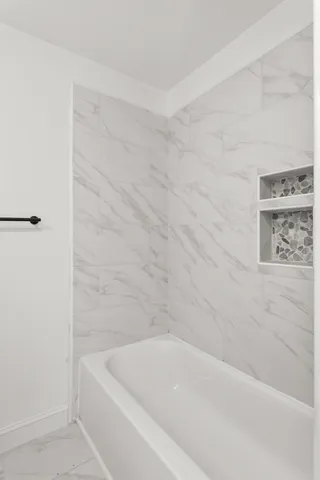 a bathroom with a bathtub