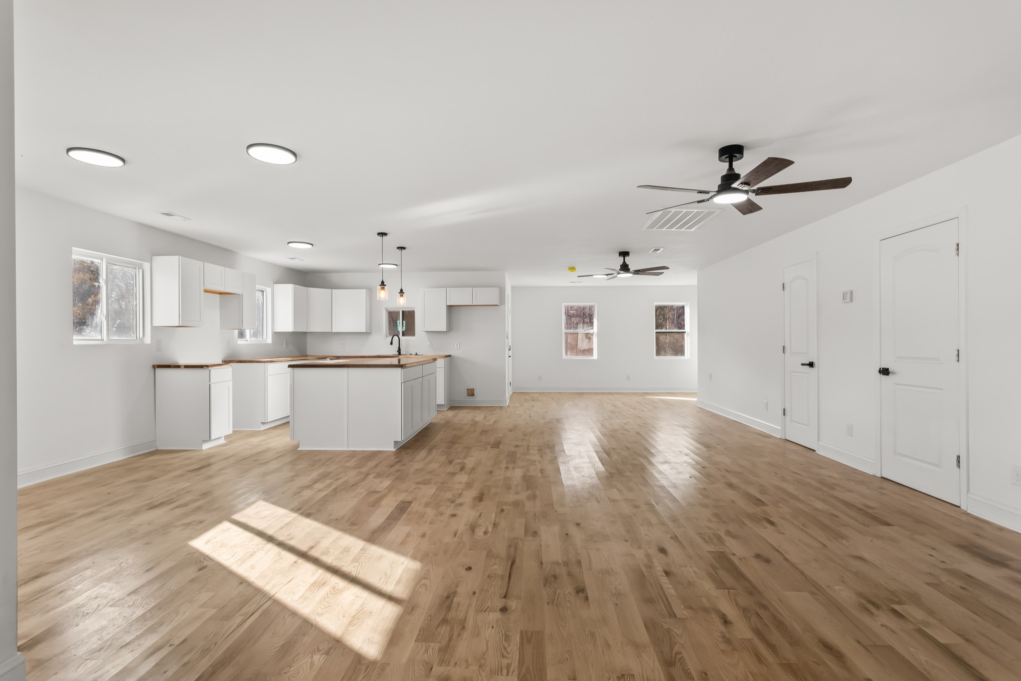 8637 Dog Branch Road Mount Pleasant, TN 38474 - Photo 6 of 44 a view of kitchen with wooden floor and window