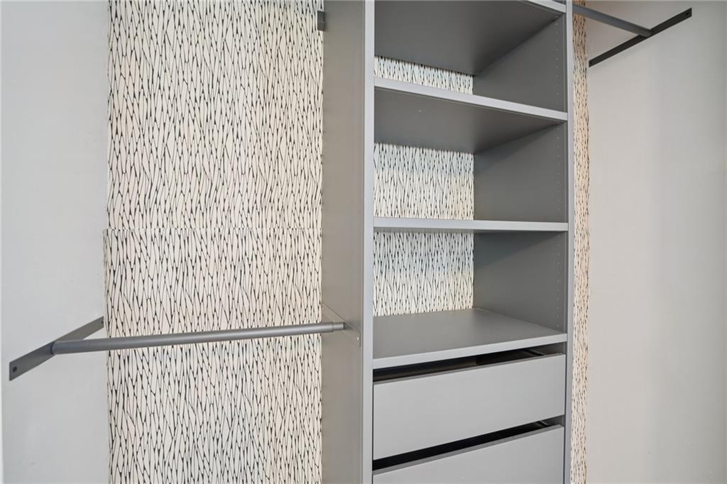 890 Glendale Terrace Northeast, Unit 1 Atlanta, GA 30309 - Photo 15 of 19 a view of kitchen with cabinets and wooden floor