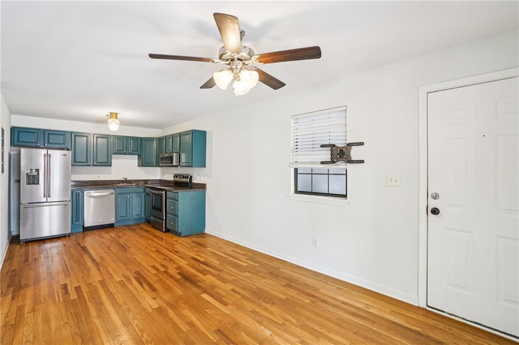 890 Glendale Terrace Northeast, Unit 1 Atlanta, GA 30309 - Photo 3 of 19 a view of kitchen with wooden floor