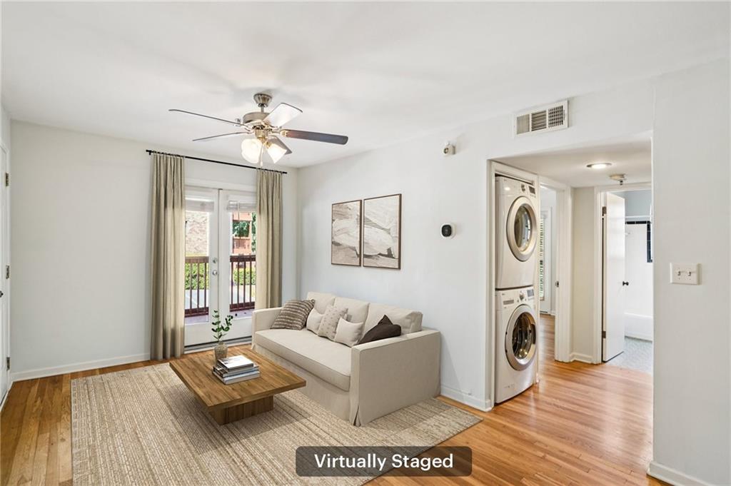 890 Glendale Terrace Northeast, Unit 1 Atlanta, GA 30309 - Photo 4 of 19 a living room with furniture and a fireplace