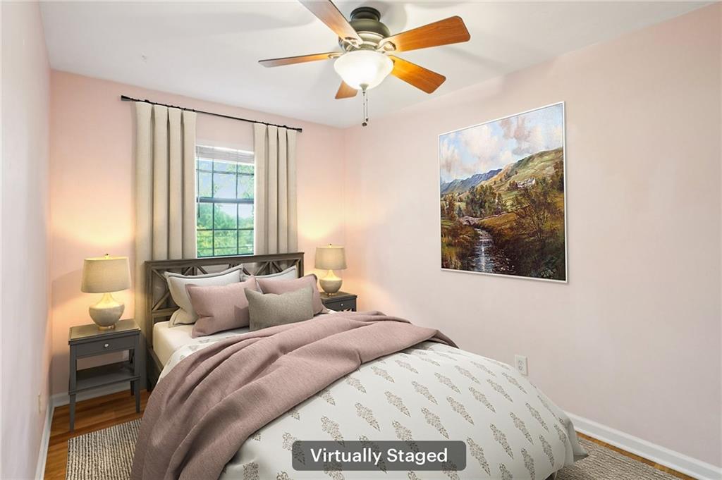 890 Glendale Terrace Northeast, Unit 1 Atlanta, GA 30309 - Photo 10 of 19 a bedroom with a bed and a window