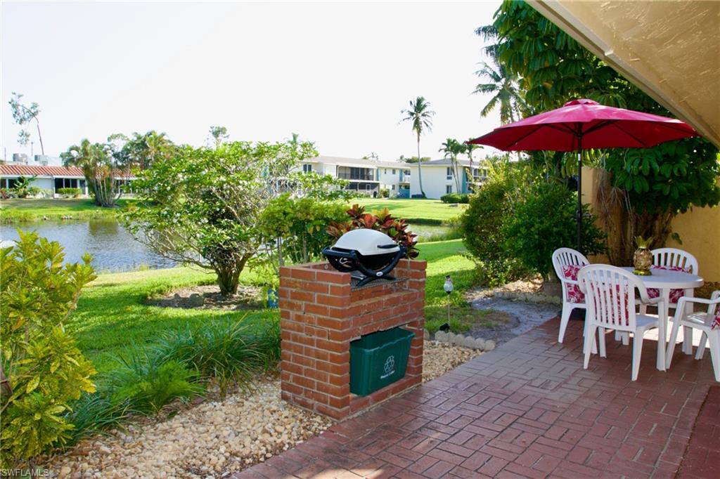116 Harrison Road, Unit N2 Naples, FL 34112 - Photo 12 of 24 Lanai looking to lake view