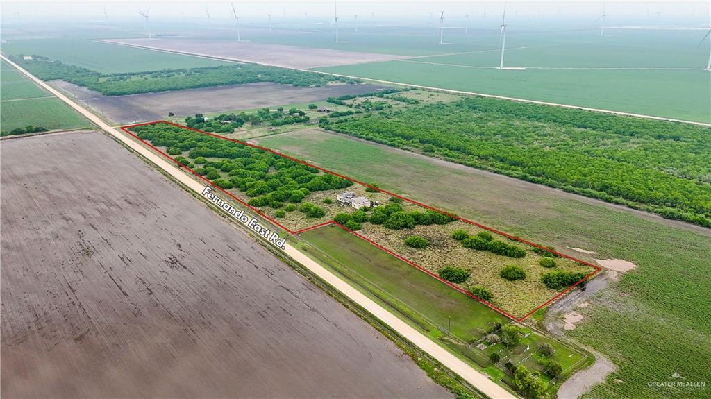 34173 Fernando East Road Rio Hondo, TX 78583 - Photo 3 of 7 a view of a garden with a bench