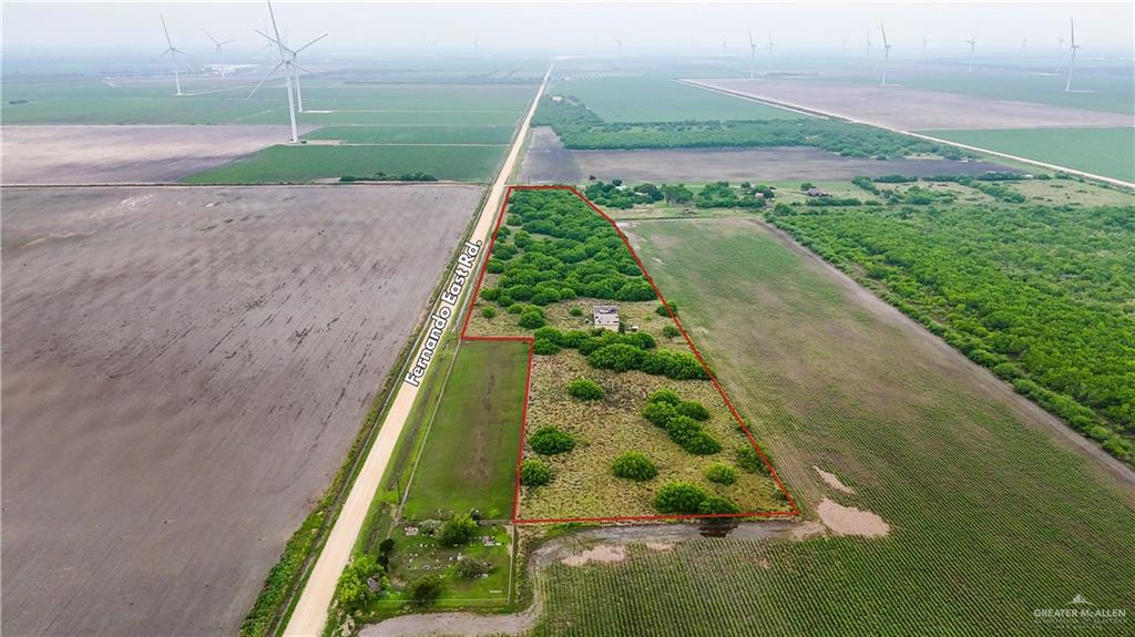 34173 Fernando East Road Rio Hondo, TX 78583 - Photo 4 of 7 a view of a yard with potted plants