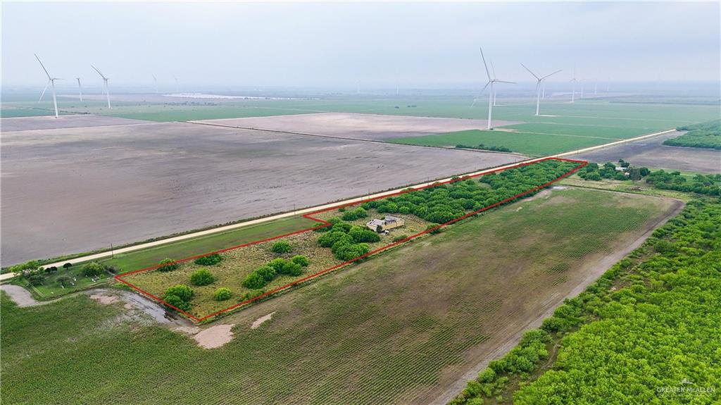 34173 Fernando East Road Rio Hondo, TX 78583 - Photo 7 of 7 a view of a back yard with flower plants