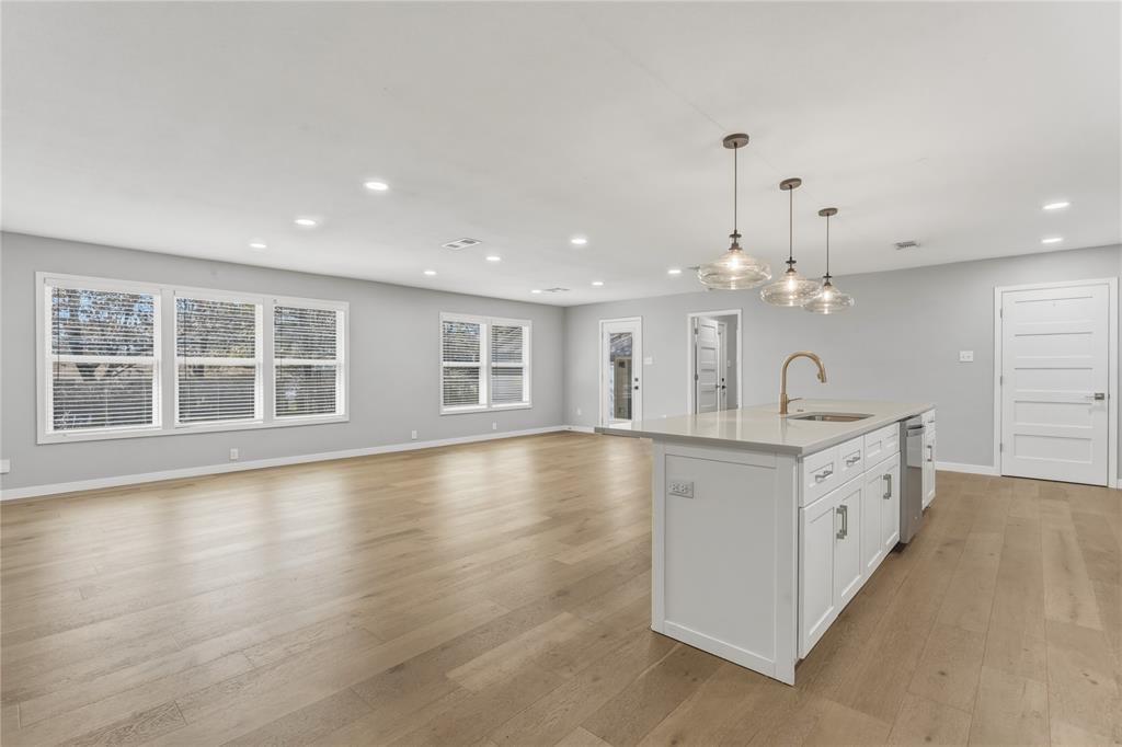 4600 Cedar Mountain Drive Waco, TX 76708 - Photo 11 of 40 a large white kitchen with a large window