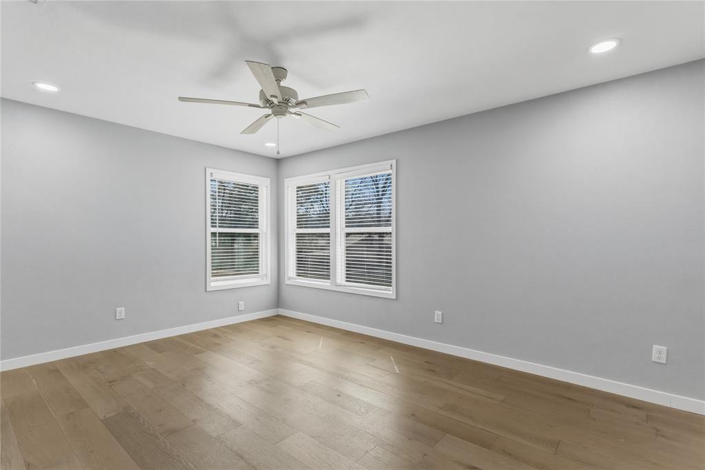 4600 Cedar Mountain Drive Waco, TX 76708 - Photo 17 of 40 an empty room with a window and ceiling fan