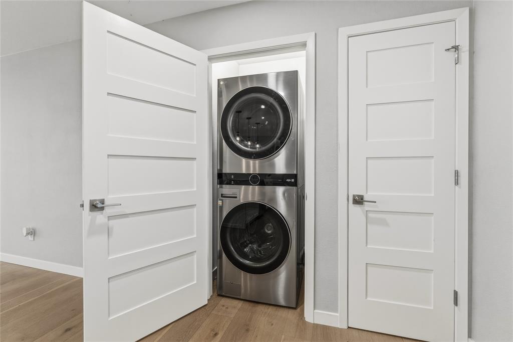 4600 Cedar Mountain Drive Waco, TX 76708 - Photo 21 of 40 a view of a hallway with washer and dryer