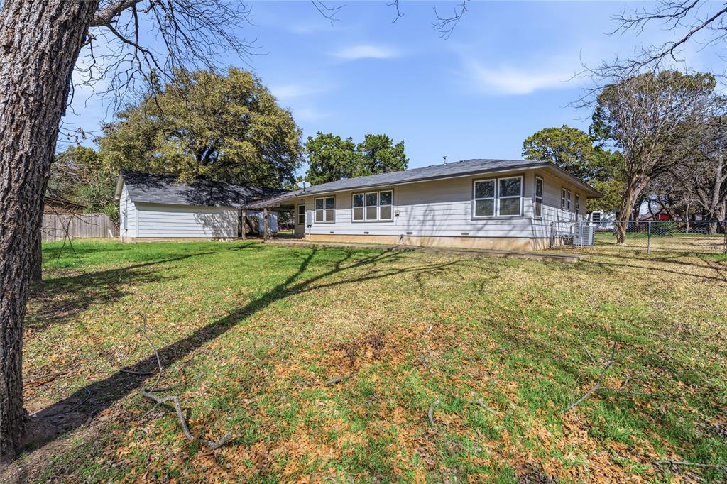 4600 Cedar Mountain Drive Waco, TX 76708 - Photo 35 of 40 a front view of a house with a yard