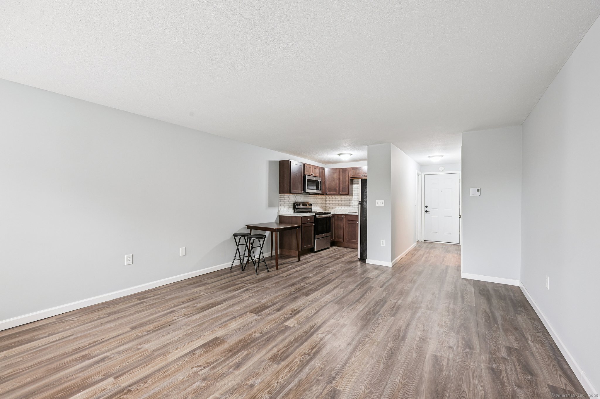 356 Franklin Avenue, Unit A4 Hartford, CT 06114 - Photo 14 of 21 a view of a kitchen with furniture and wooden floor