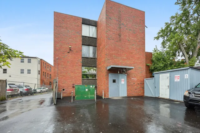 a view of a street with building