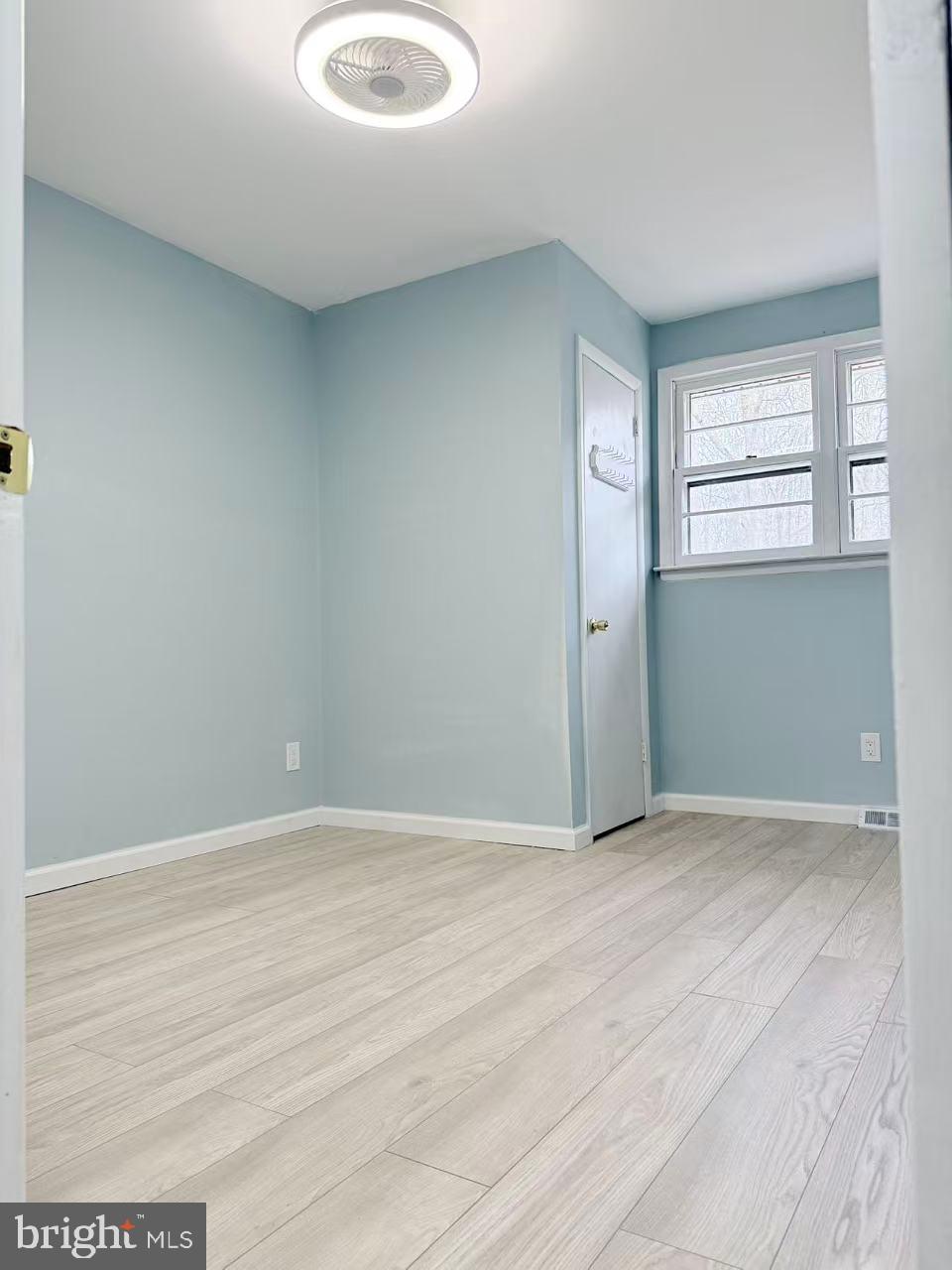 4529 Robin Road Newfield, NJ 08344 - Photo 22 of 39 an empty room with windows and entrance