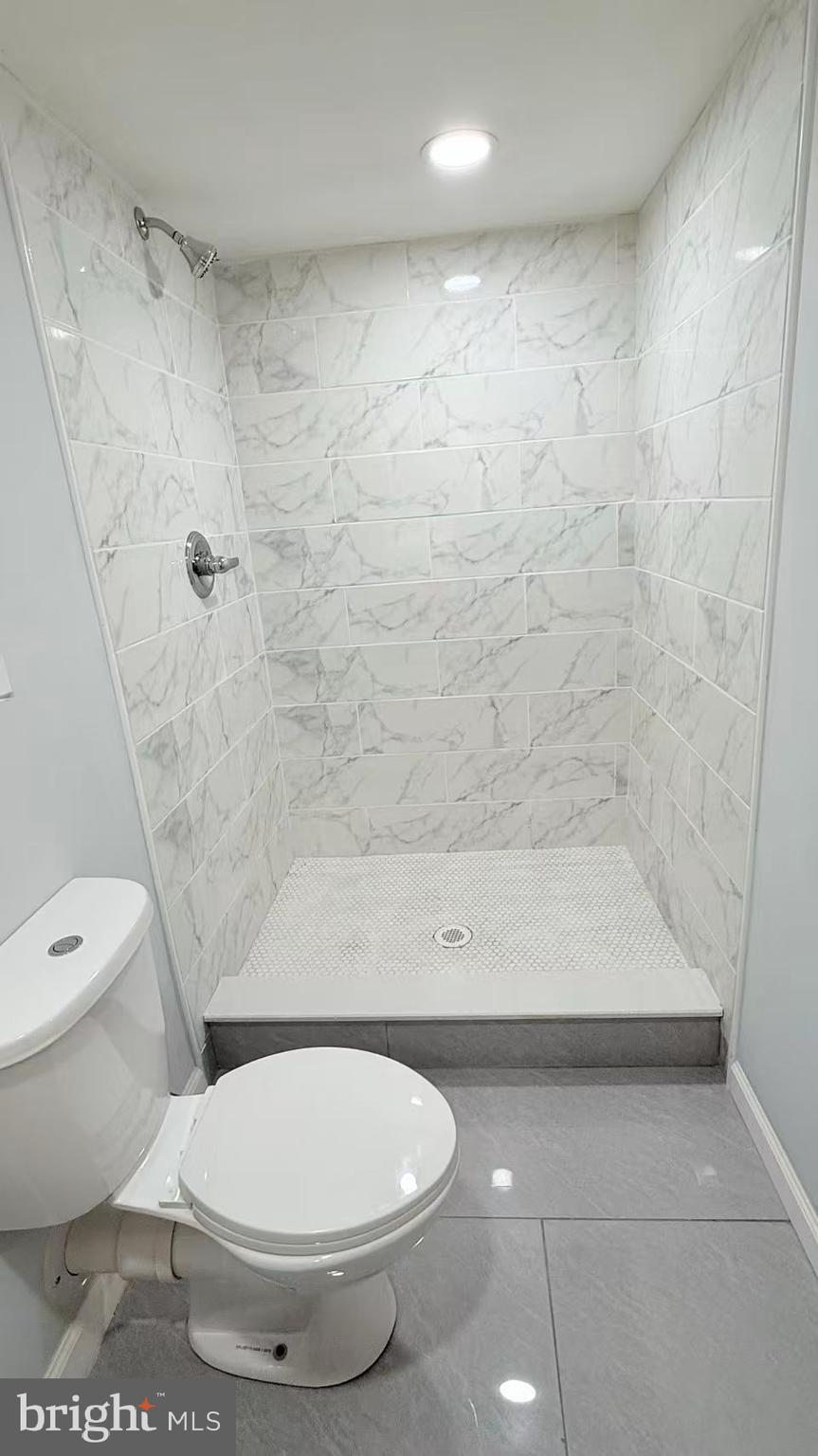 4529 Robin Road Newfield, NJ 08344 - Photo 35 of 39 a bathroom with a toilet and a shower