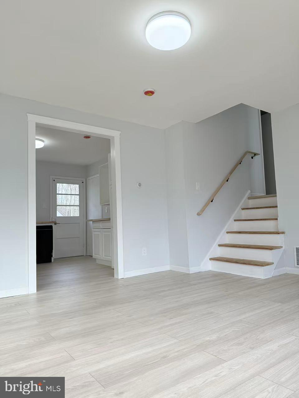 4529 Robin Road Newfield, NJ 08344 - Photo 7 of 39 a view of entryway and hall with wooden floor