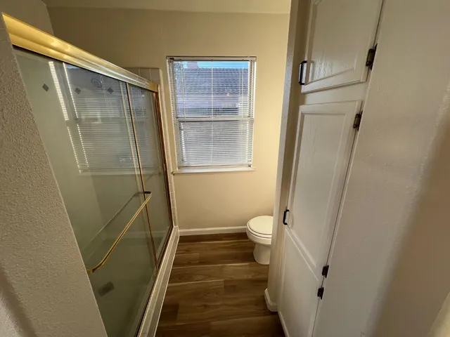 a bathroom with a sink and toilet