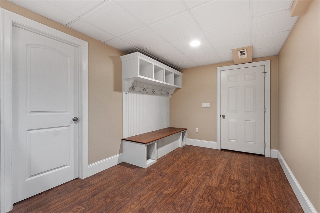 19 Barton Road Harvard, MA 01451 - Photo 17 of 20 an empty room with wooden floor and windows