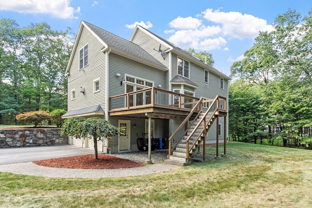 19 Barton Road Harvard, MA 01451 - Photo 19 of 20 a view of a house with a yard