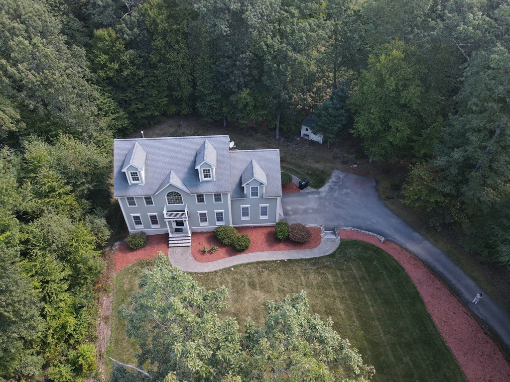 19 Barton Road Harvard, MA 01451 - Photo 20 of 20 an aerial view of a house with swimming pool big yard and large trees