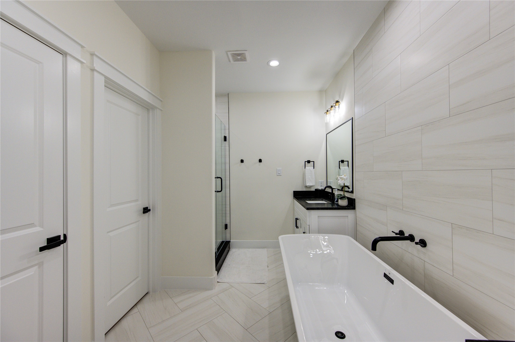 3406 Garapan Street, Unit A Houston, TX 77091 - Photo 33 of 44 a bathroom with a sink a toilet and shower