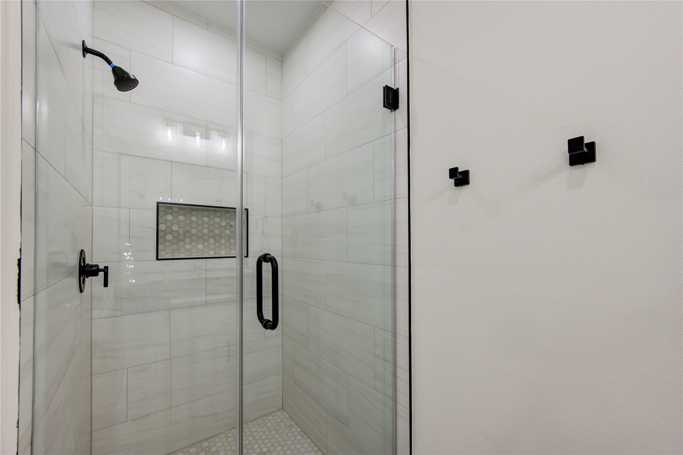 3406 Garapan Street, Unit A Houston, TX 77091 - Photo 36 of 44 a bathroom with a shower