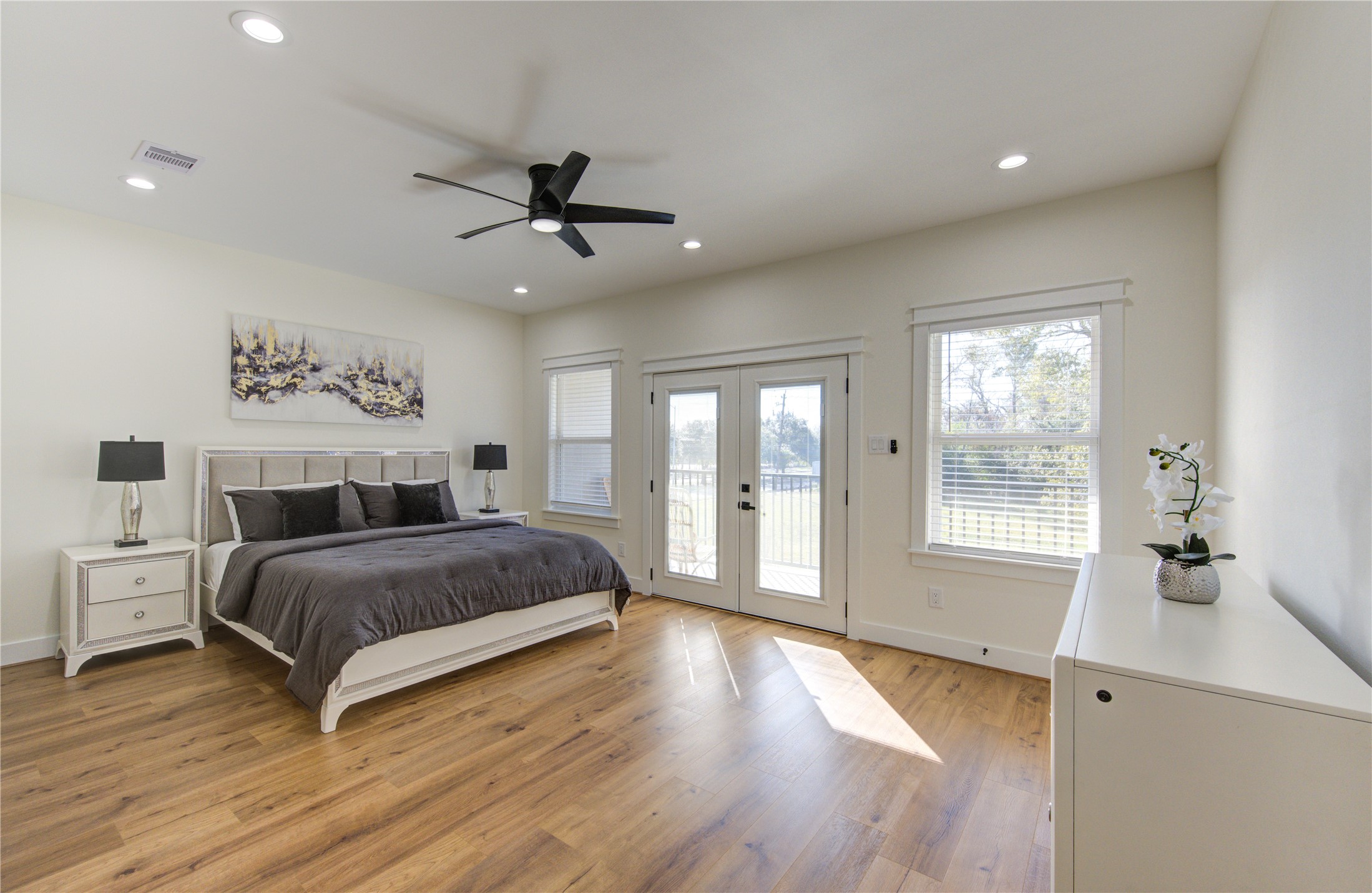 3406 Garapan Street, Unit A Houston, TX 77091 - Photo 44 of 44 a bedroom with a large bed and a large window