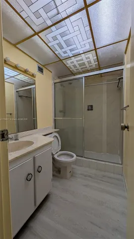 a kitchen with a stove and a microwave