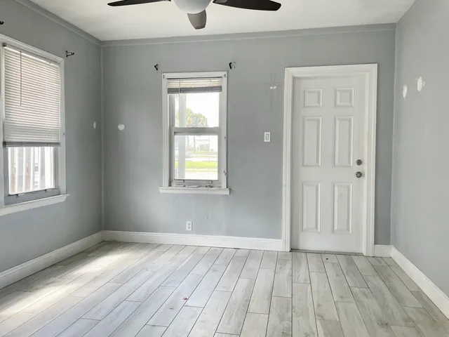 a view of a city with lots of trees